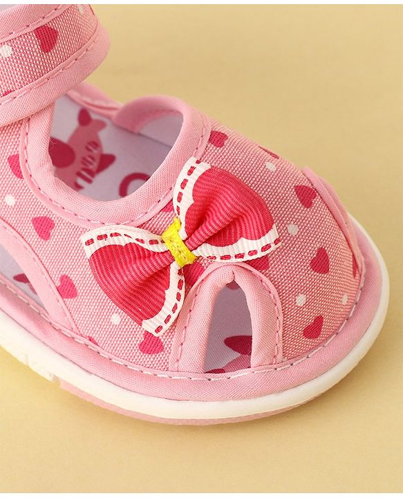 Cute Walk by Babyhug Velcro Closure Musical Sandals with Heart Print & Bow - Pink