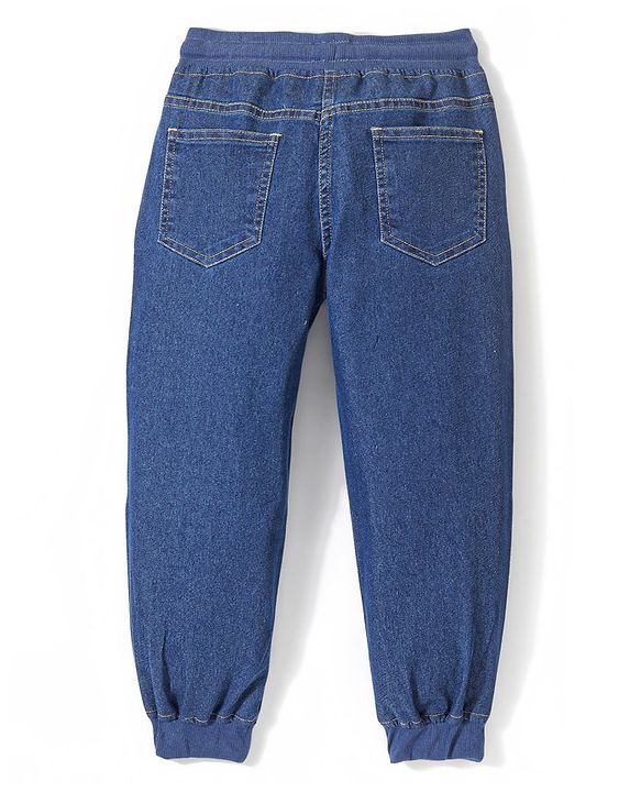 Pine Kids Marvel Cotton Blend Full Length Whiskered Denim Jogger With Marvel Text Print And Avenger Badge - Blue