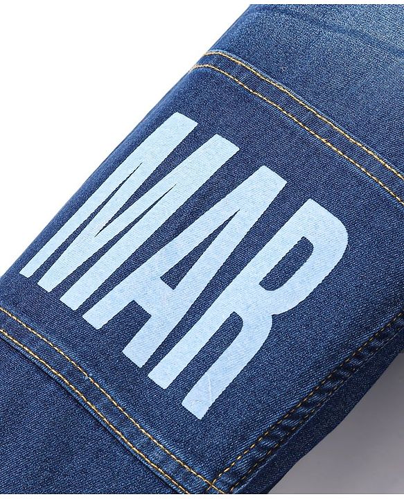 Pine Kids Marvel Cotton Blend Full Length Whiskered Denim Jogger With Marvel Text Print And Avenger Badge - Blue