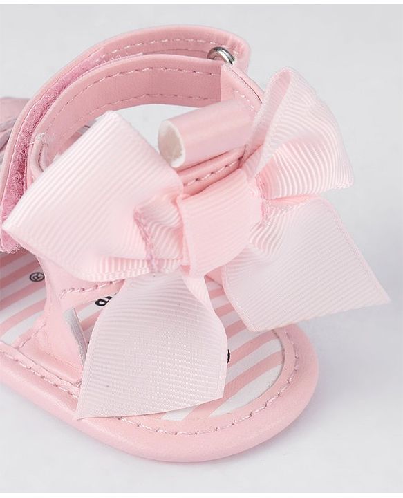 Cute Walk by Babyhug Velcro Closure Striped Booties with Bow Applique- Pink