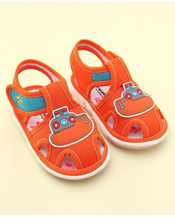 Cute Walk by Babyhug Velcro Closure Musical Sandals with Ship Applique -Orange