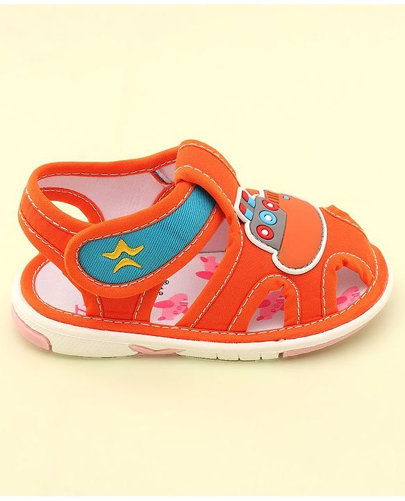 Cute Walk by Babyhug Velcro Closure Musical Sandals with Ship Applique -Orange