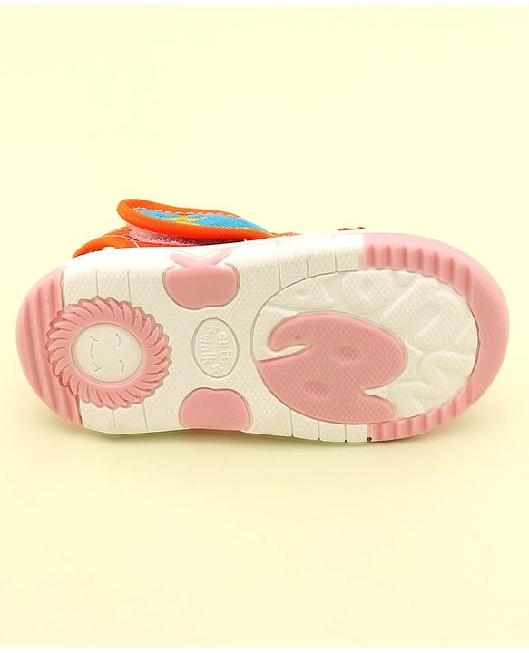 Cute Walk by Babyhug Velcro Closure Musical Sandals with Ship Applique -Orange