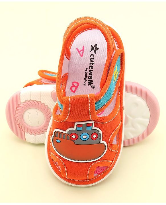 Cute Walk by Babyhug Velcro Closure Musical Sandals with Ship Applique -Orange