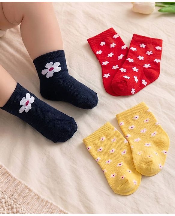 Cute Walk by Babyhug Ankle Length Antibacterial Knitted Floral Design Socks Pack Of 3 - Blue Red & Yellow
