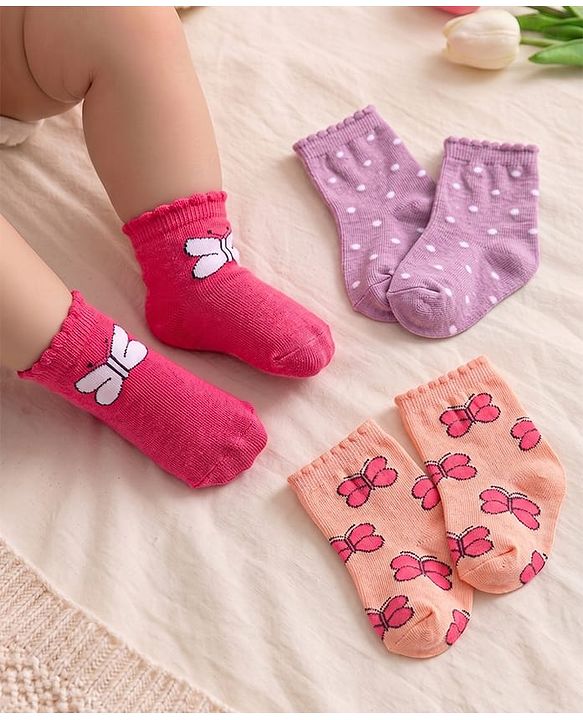 Cute Walk By Babyhug Cotton Knit Anti-Bacterial Ankle Length Socks With Butterfly & Polka Dot Design Pack Of 3 - Purple Pink & Red