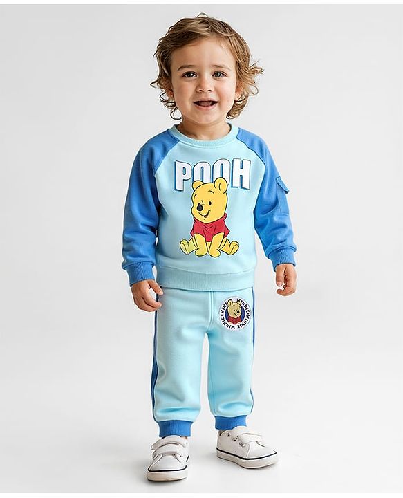 Babyhug Disney Terry Knit Full Raglan Sleeves T-Shirt & Cut & Sew Lounge Pant with Winnie the Pooh Graphics - Light Blue