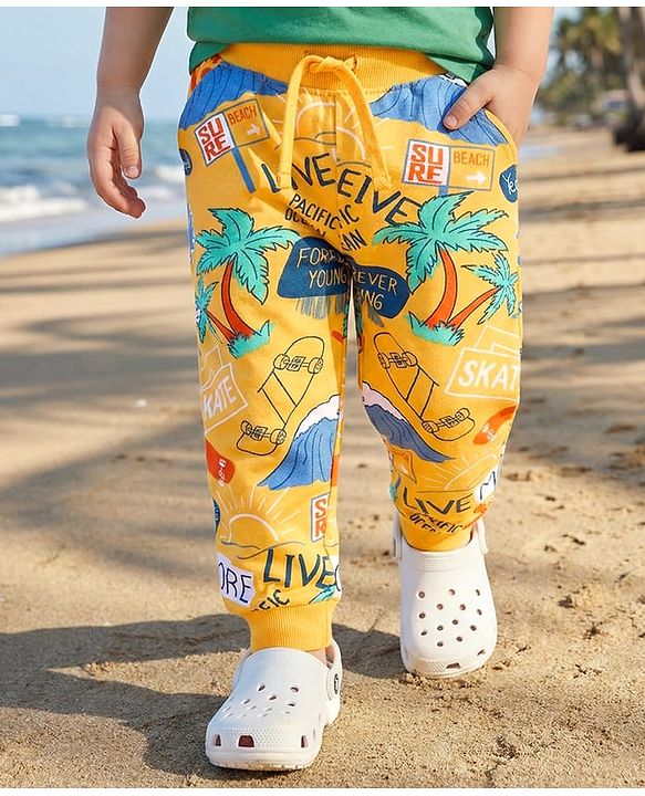 Babyhug Terry Knit Full Length Lounge Pant With Beach Theme Print - Yellow