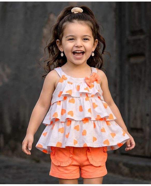 Babyhug 100% Cotton Single Jersey Knit Singlet Sleeves Top & Shorts Set With Heart Print & Bow Applique - Orange