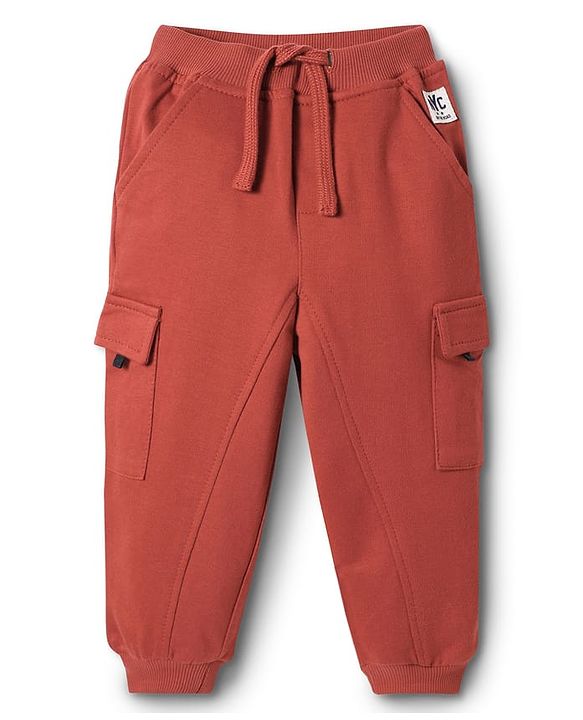 Babyhug Cotton Looper Knit Solid Lounge Pant With Cargo Pockets - Rust Orange