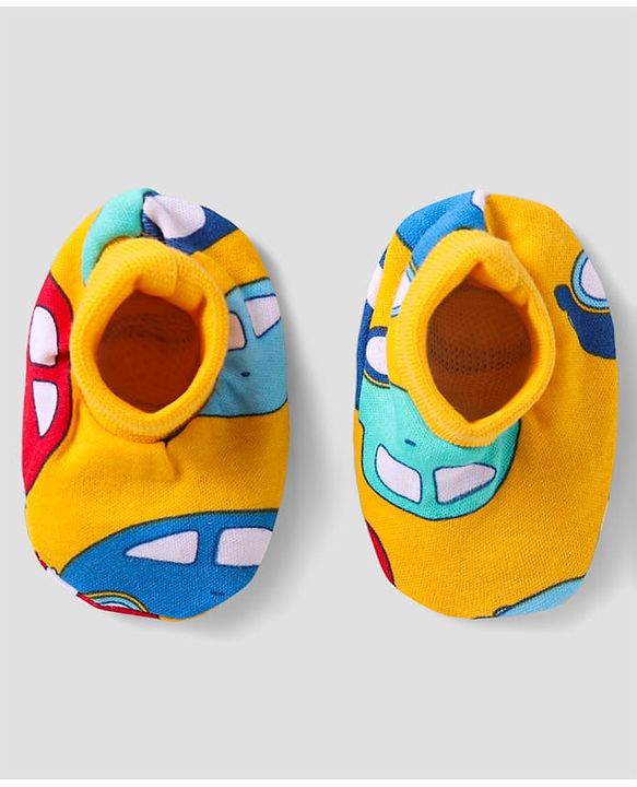 Babyhug 100% Cotton Cap Mittens And Booties Vehicle Printed - Yellow Packet Dim- 19x18cm, Cap Diameter-11x12cm, Mittens- 9cm, Bootties- 9.5cm, Age-Preemie, Pieces- 5