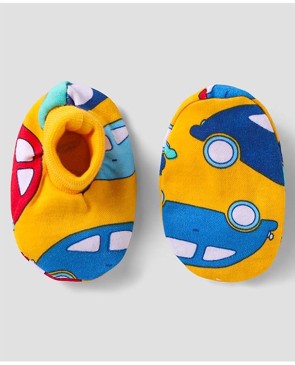 Babyhug 100% Cotton Cap Mittens And Booties Vehicle Printed - Yellow Packet Dim- 19x18cm, Cap Diameter-11x12cm, Mittens- 9cm, Bootties- 9.5cm, Age-Preemie, Pieces- 5