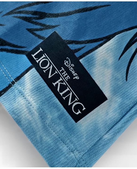 Pine Kids Disney Terry Knit Half Sleeves Oversized And Drop Shoulder Tie And Dye T-Shirt With Lion King Graphics And Badge Detailing  - Blue