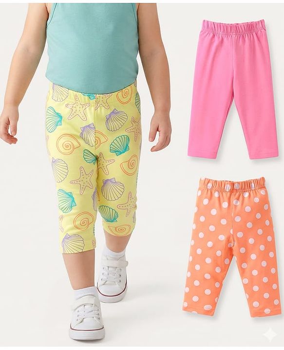 Babyhug Cotton Lycra Knit Three Fourth Length Leggings With Polka Dots & Star Fish Print Pack of 3 - Pink Yellow & Orange