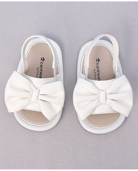 Cute Walk by Babyhug Booties with Back Strap & Bow Applique - White