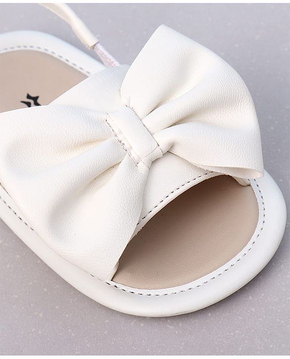 Cute Walk by Babyhug Booties with Back Strap & Bow Applique - White