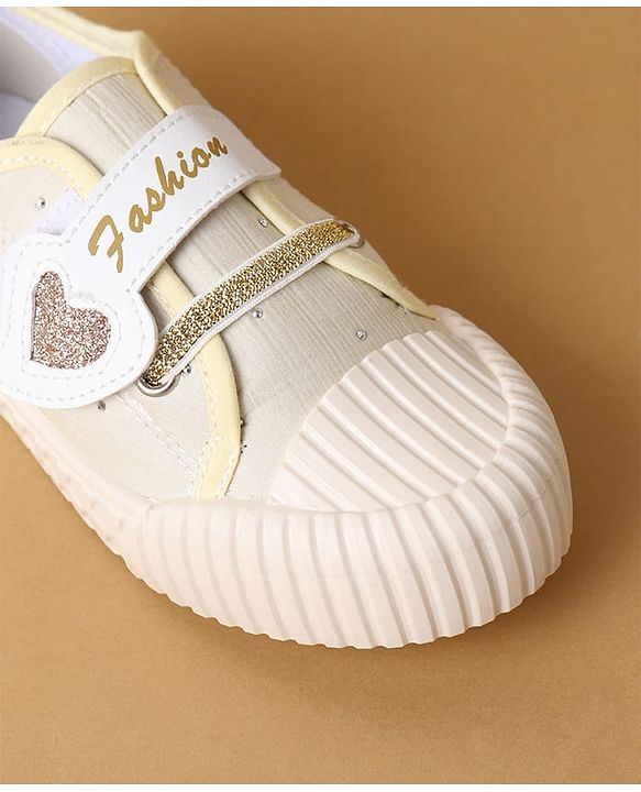 Cute Walk by Babyhug Velcro Closure Casual Shoes with Heart Sequin Detailing - Light Yellow