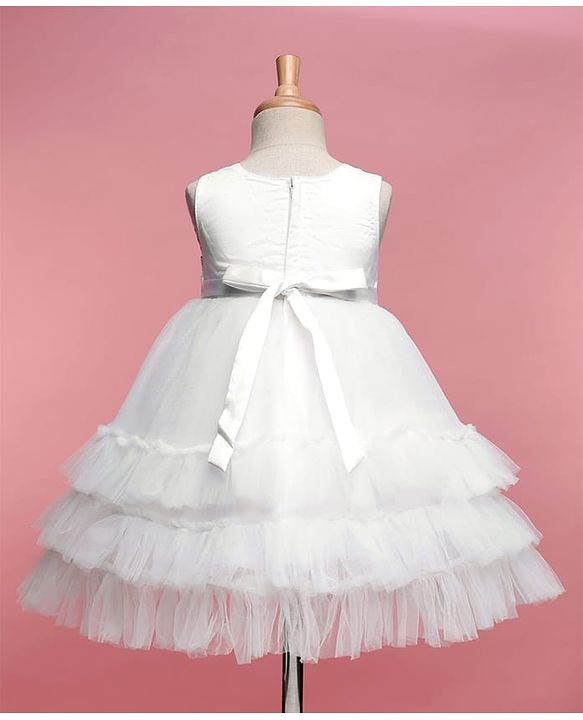Babyhug Woven Sleeveless Sequinned Yoke Mesh Party Dress With Bow Applique - White