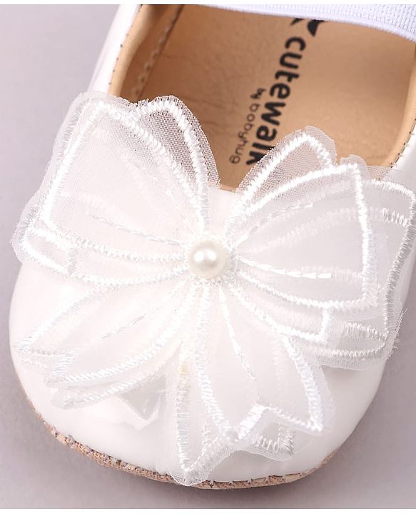 Cute Walk by Babyhug Slip On Booties with Bow Applique - Golden