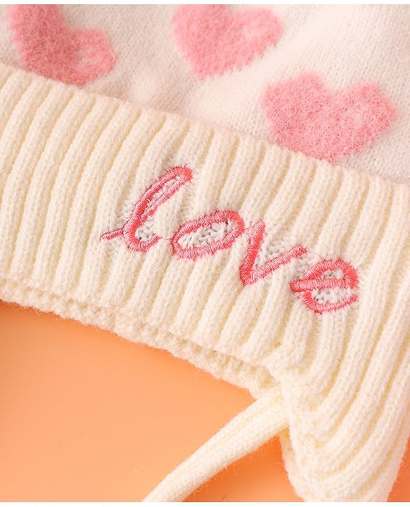 Babyhug Woollen Cap With Heart Design Cream - Diameter 12 cm