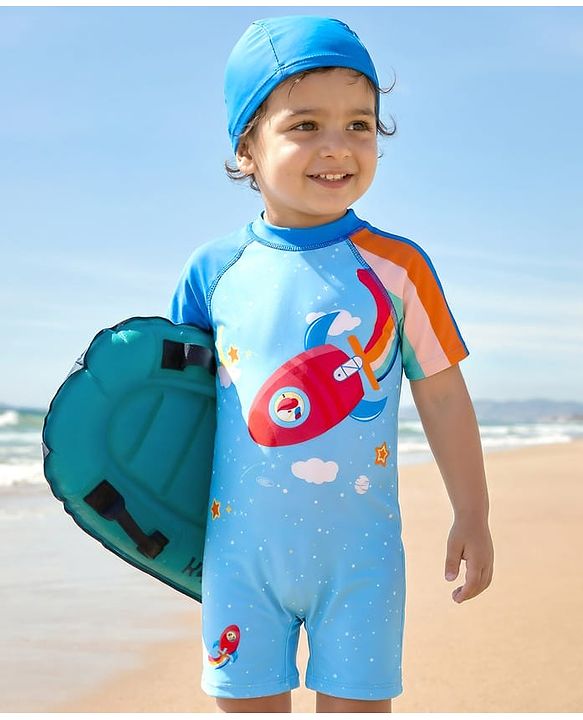 Babyhug Half Raglan Sleeves Legged Swimsuit With Rocket Print & Cap - Light Blue