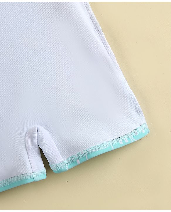 Babyhug Half Sleeves Legged Swimsuit  With Dino Print & Cap - Light Blue