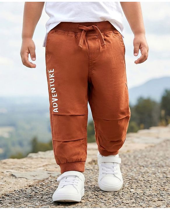 Babyhug Cotton Woven Full Length Jogger With Adventure Print - Rust Orange
