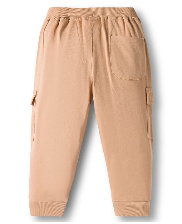 Babyhug French Terry Knit Full Length Lounge Pant With Text Badge - Cream