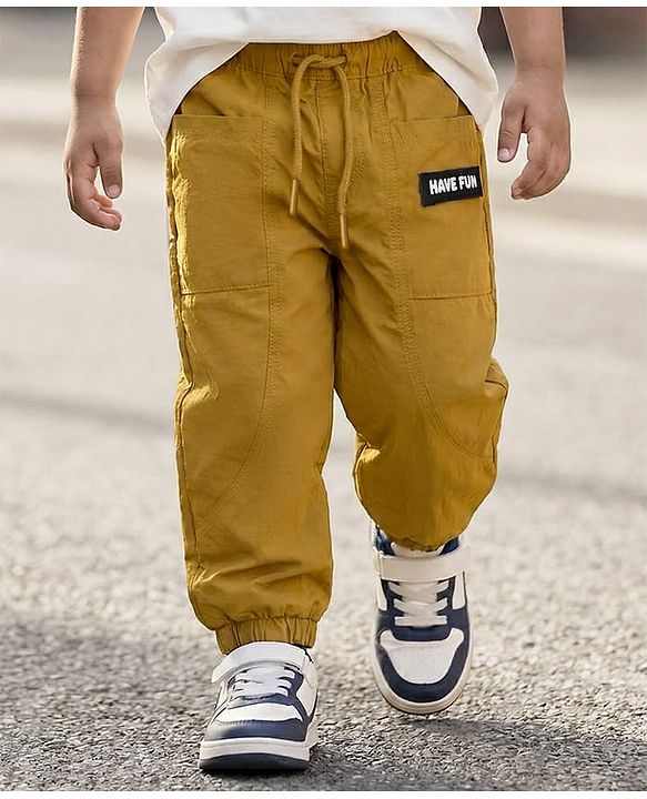 Babyhug Woven Full Length Solid Trouser With Stretch - Dark Yellow