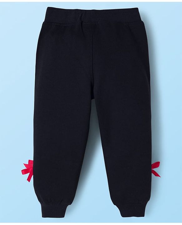 Babyhug Disney Terry Knit Full Sleeves T-Shirt and Track Pant Set with Minnie Mouse Graphic & Bow Detailing - White & Black