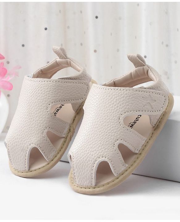 Cute Walk by Babyhug Solid Booties With Textured Design - White