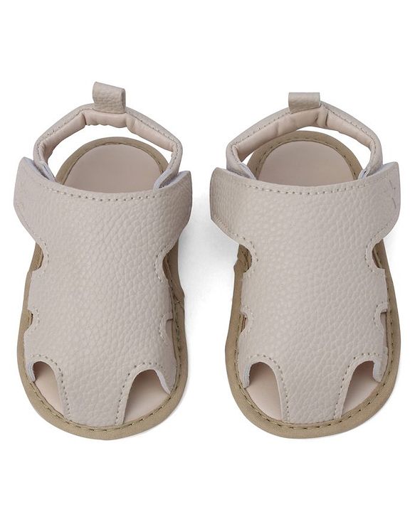 Cute Walk by Babyhug Solid Booties With Textured Design - White
