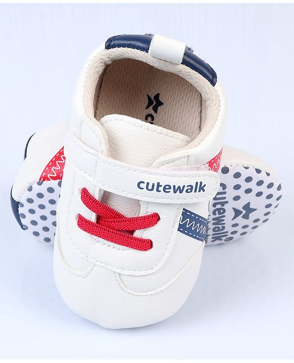 Cute Walk by Babyhug Velcro Closure Printed Booties - Pink & White