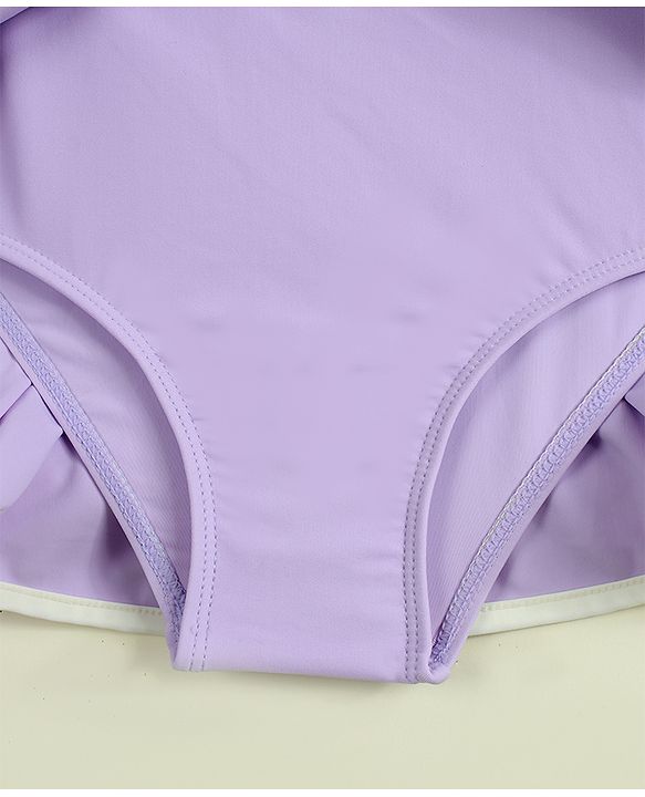 Babyhug Sleeveless Solid Frock Swimsuit With Bow Applique & Cap - Purple