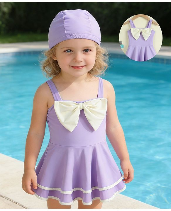 Babyhug Sleeveless Solid Frock Swimsuit With Bow Applique & Cap - Purple