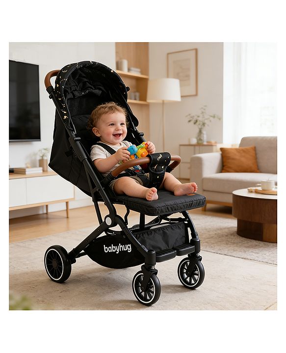 Babyhug Portable Baby Stroller with One-Hand Compact Fold Newborn Pram Concealed Linked Brake, Front Swivel Wheels, Safety Harness, Shock Absorbing Wheels Storage Basket Moon & Star Print - Black