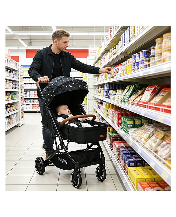 Babyhug Portable Baby Stroller with One-Hand Compact Fold Newborn Pram Concealed Linked Brake, Front Swivel Wheels, Safety Harness, Shock Absorbing Wheels Storage Basket Moon & Star Print - Black