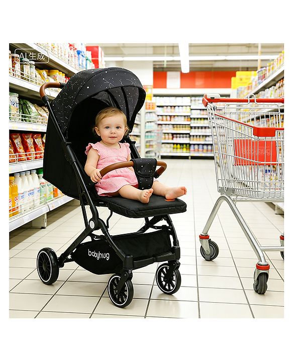 Babyhug Portable Baby Stroller with One-Hand Compact Fold Newborn Pram Concealed Linked Brake, Front Swivel Wheels, Safety Harness, Shock Absorbing Wheels Storage Basket Moon & Star Print - Black
