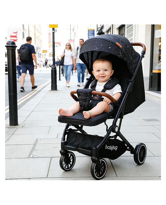 Babyhug Portable Baby Stroller with One-Hand Compact Fold Newborn Pram Concealed Linked Brake, Front Swivel Wheels, Safety Harness, Shock Absorbing Wheels Storage Basket Moon & Star Print - Black