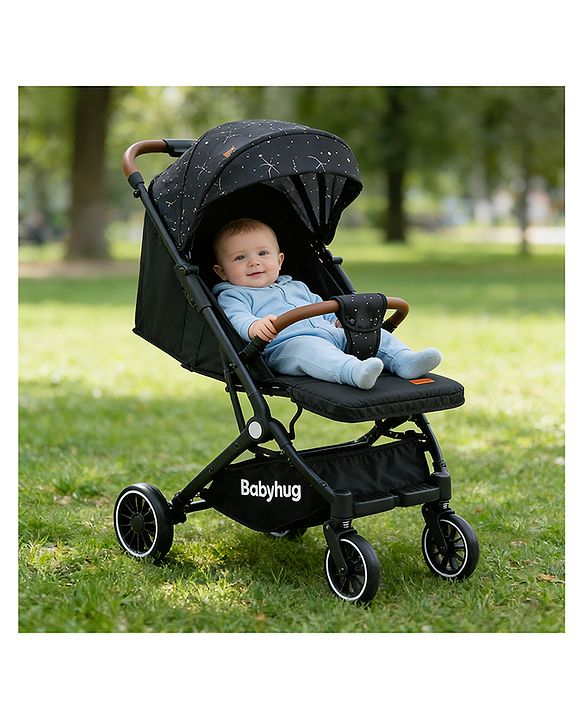 Babyhug Portable Baby Stroller with One-Hand Compact Fold Newborn Pram Concealed Linked Brake, Front Swivel Wheels, Safety Harness, Shock Absorbing Wheels Storage Basket Moon & Star Print - Black