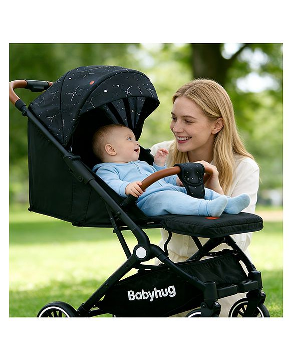 Babyhug Portable Baby Stroller with One-Hand Compact Fold Newborn Pram Concealed Linked Brake, Front Swivel Wheels, Safety Harness, Shock Absorbing Wheels Storage Basket Moon & Star Print - Black
