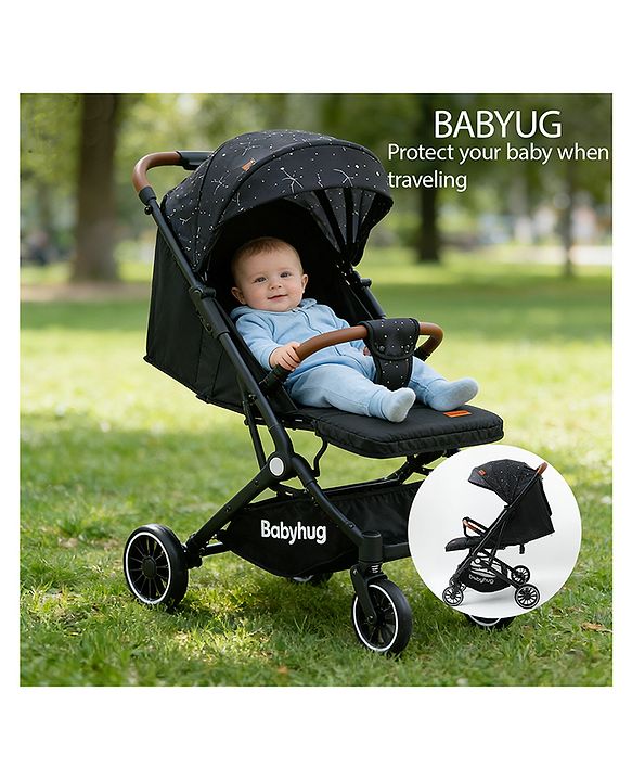 Babyhug Portable Baby Stroller with One-Hand Compact Fold Newborn Pram Concealed Linked Brake, Front Swivel Wheels, Safety Harness, Shock Absorbing Wheels Storage Basket Moon & Star Print - Black
