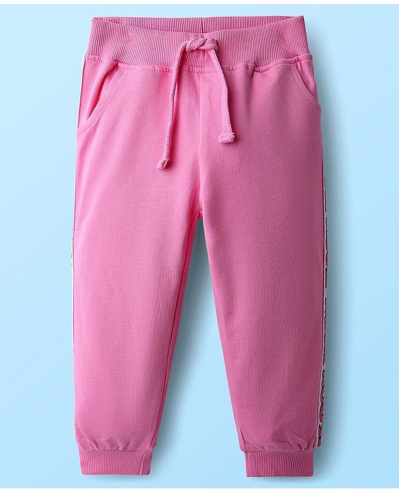 Babyhug Disney Single Jersey Knit Half Sleeves Oversized Drop Shoulder T-Shirt & Track Pant Set with Front and Back Minnie Mouse Graphic - White & Pink