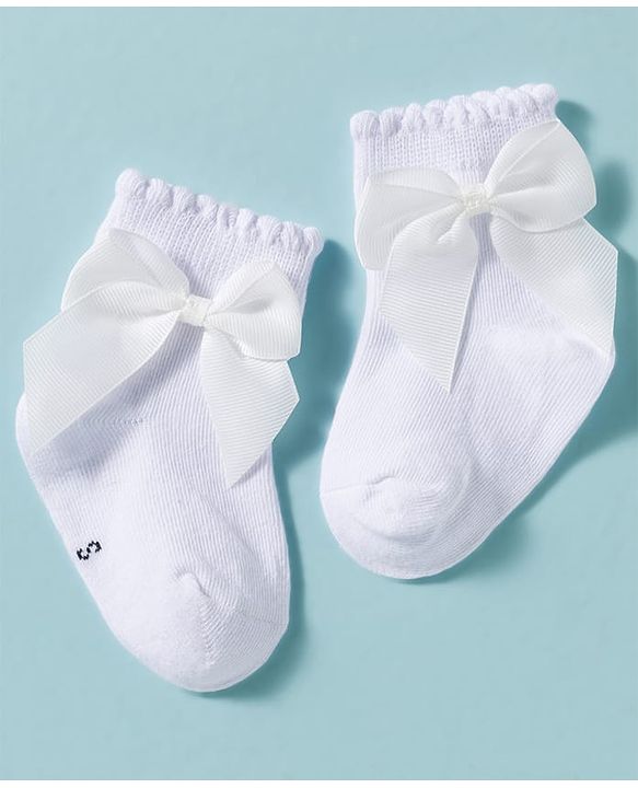 Cute Walk by Babyhug Non Terry Knit Ankle Length Solid Party Socks With Bow Applique Pack of 3 - Multicolor
