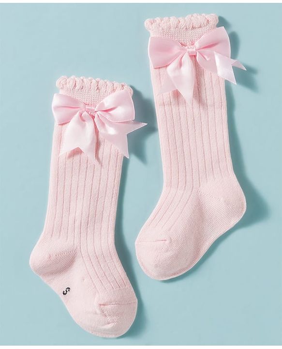 Cute Walk by Babyhug Non Terry Knit Calf Length Solid Party Socks with Bow Applique & Cable Knit Design - Pink