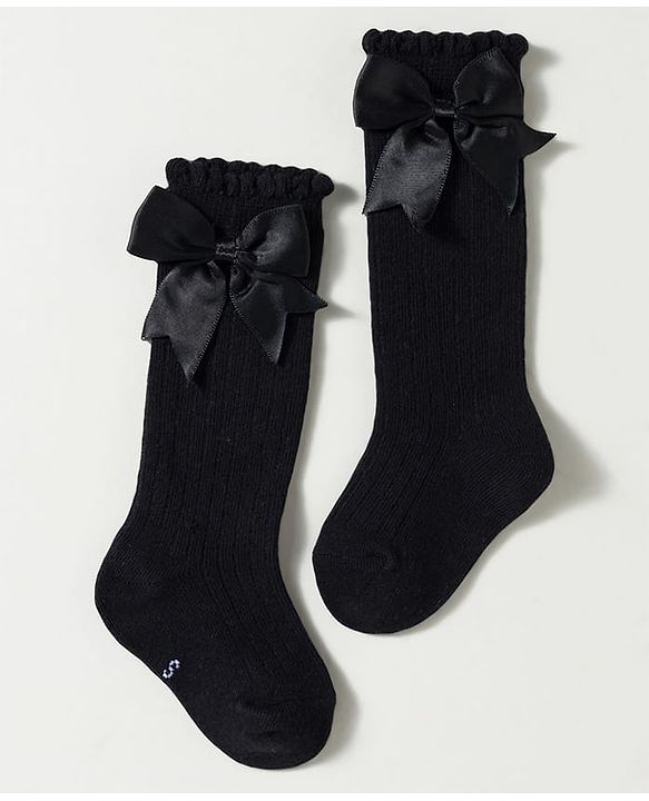 Cute Walk by Babyhug Non Terry Knit Calf Length Solid Party Socks with Bow Applique & Cable Knit Design - Pink
