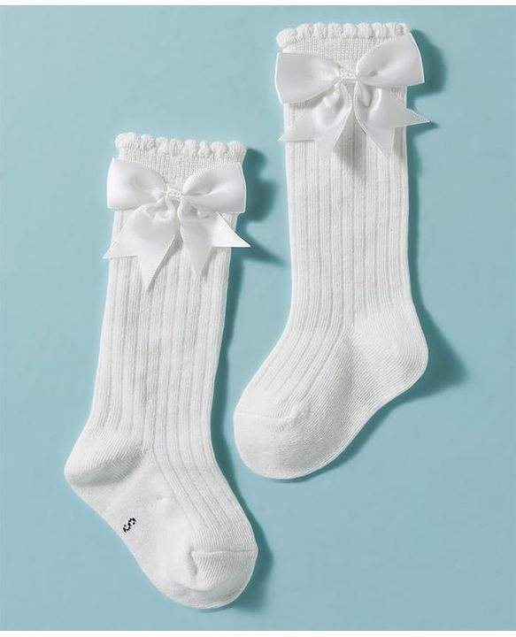 Cute Walk by Babyhug Non Terry Knit Calf Length Solid Party Socks with Bow Applique & Cable Knit Design - Pink