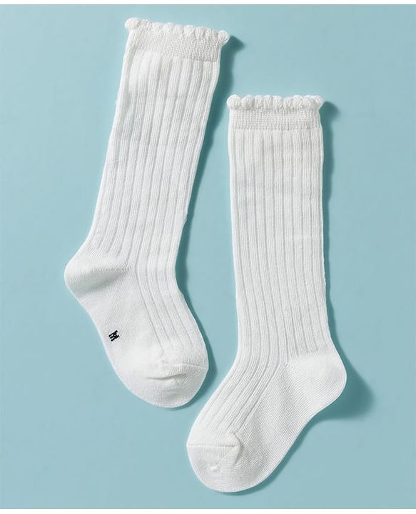 Cute Walk by Babyhug Non Terry Knit Calf Length Solid Party Socks with Bow Applique & Cable Knit Design - Pink