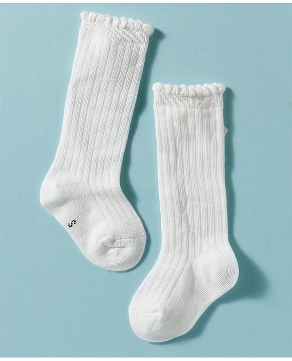 Cute Walk by Babyhug Non Terry Knit Calf Length Solid Party Socks with Bow Applique & Cable Knit Design - Pink