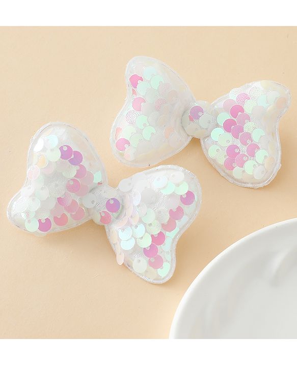 Babyhug Free Size Sequin Bow & Butterfly Clips Pack Of 2 - Off White.